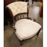 A Victorian carved walnut and fabric upholstered lady's chair