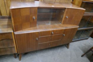 A Beautility walnut side cabinet