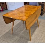 An Ercol Blonde elm and beech Windsor drop-leaf table