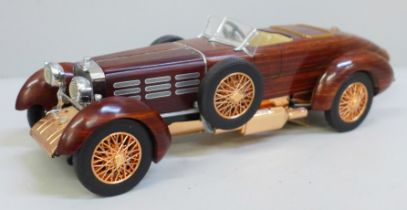 A Franklin Mint 1924 Hispano-Swiza tulipwood vintage model vehicle with certificate in polystyrene