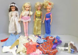 Three vintage Pedigree Sindy dolls and June doll, clothes and accessories