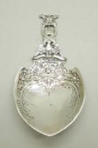 A large continental silver caddy spoon, London import mark for 1902, 79g, 75mm x 143mm