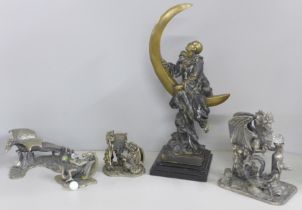 Four pewter dragon figures and one other bronze sculpture of Pierrot riding on a crescent moon after