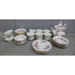 A Royal Albert Lavender Rose bone china tea service; full set of six, teapot, bread and butter