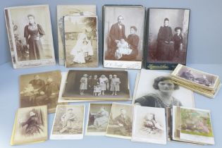 A collection of cabinet cards, carte de visite cards and postcards