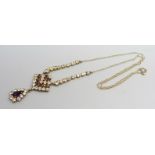 A rhinestone necklace set on a 9ct gold chain, chain 1.5g