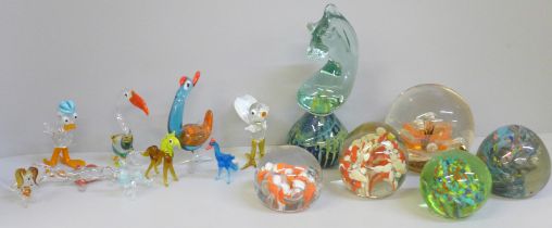A collection of lamp work glass animals, five paperweights, one larger one signed Selkirk and a