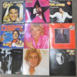 Eighteen LP records, Phil Collins, Johnny Cash, Buddy Holly, Elvis Presley, etc.
