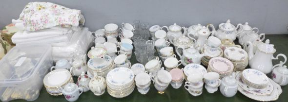 A collection of tea party wares including table linen; ten cotton table cloths, 26 cotton napkins (