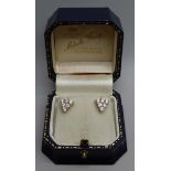 A pair of 18ct gold and diamond earrings, 0.5ct weight in each earring, 3.4g