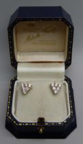 A pair of 18ct gold and diamond earrings, 0.5ct weight in each earring, 3.4g