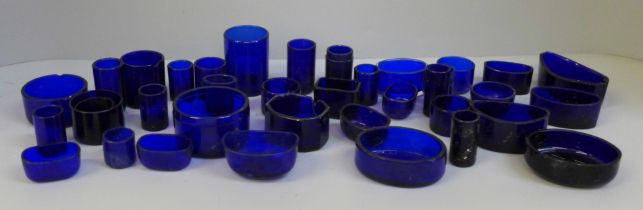 A tin of Bristol blue glass liners