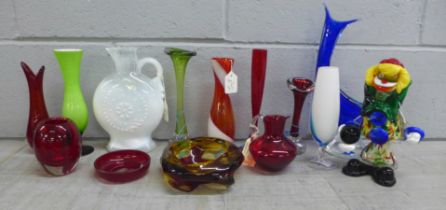 A box of mixed coloured glass including Murano clown, West German vase, Swedish bud vases **PLEASE