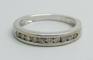A 9k white gold and diamond ring, 1.8g, J