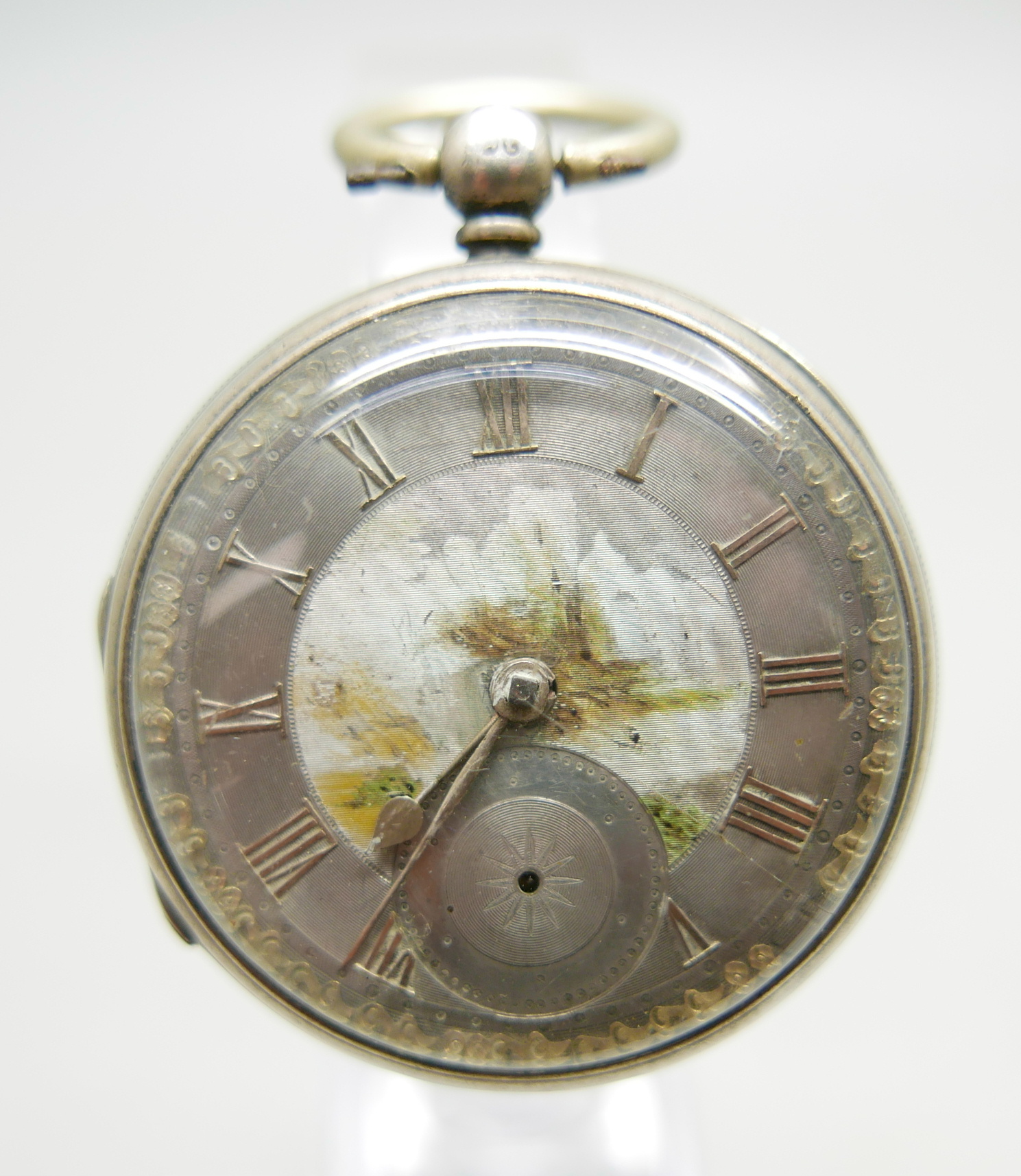 A silver pocket watch, London 1874
