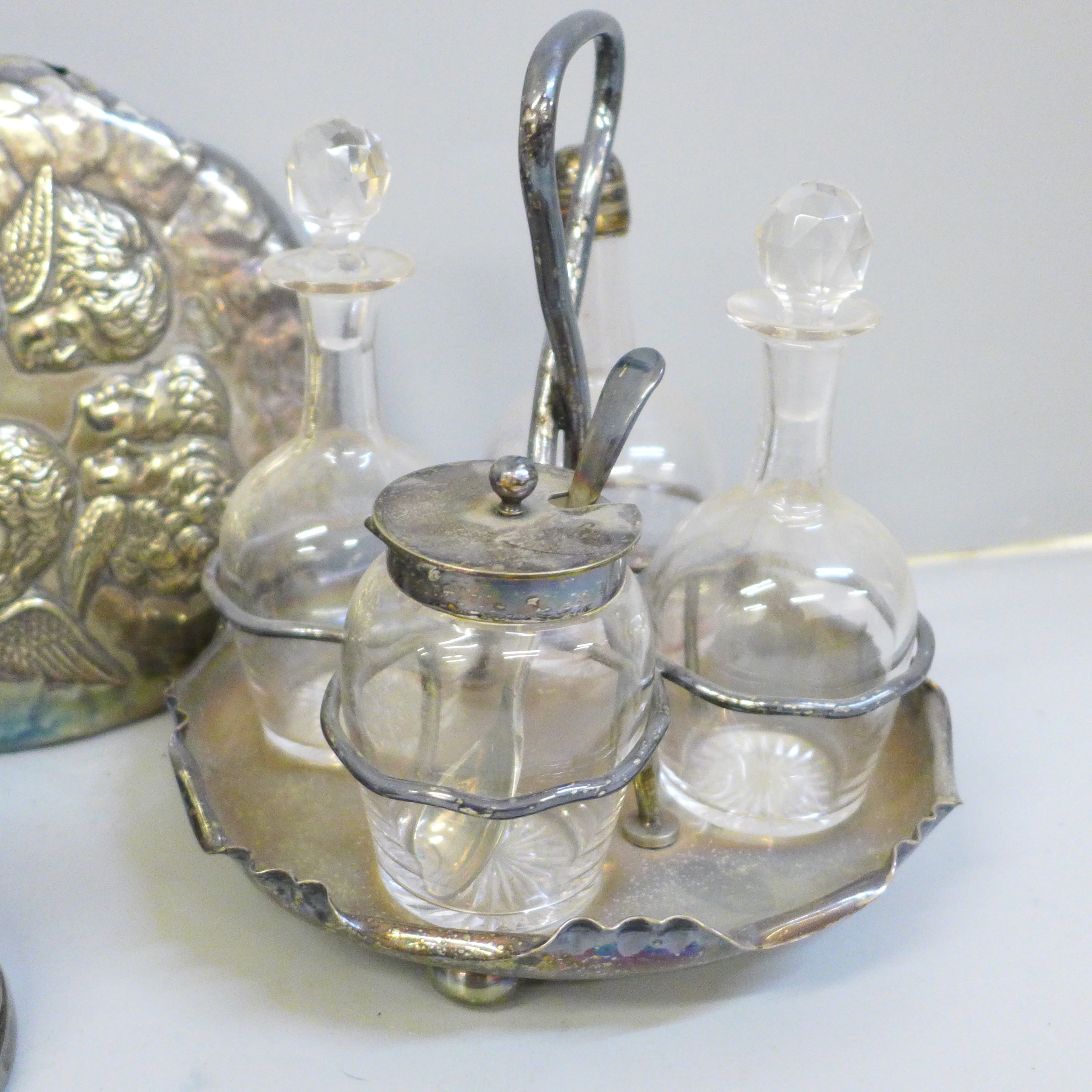 An EPNS Reynolds Angels hand mirror, a metal mounted horse's hoof and a silver plated cruet set on - Image 3 of 7