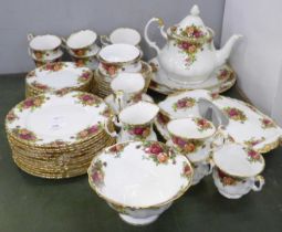 A collection of Royal Albert Old Country Roses; teapot, twelve small plates, twelve side plates,