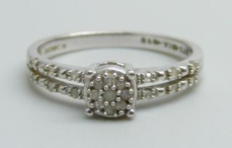 A 9ct white gold and diamond ring, 2g, L
