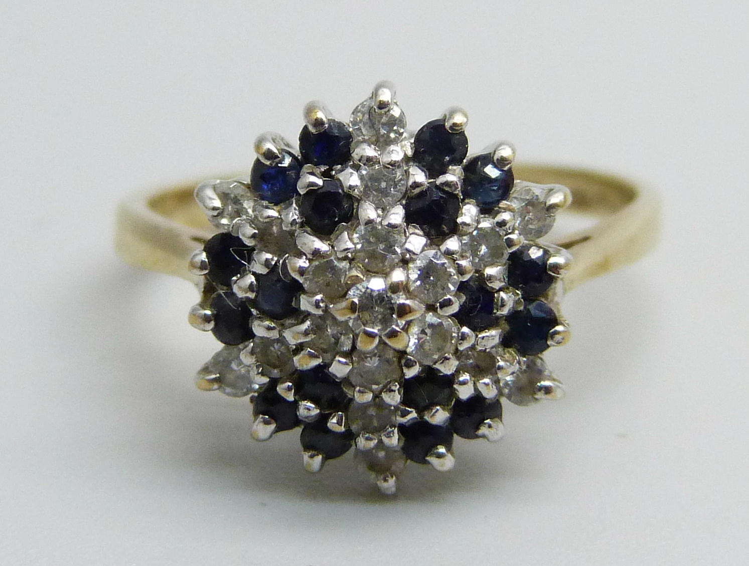 A 9ct gold, sapphire and cubic zirconia ring, 2.3g, K