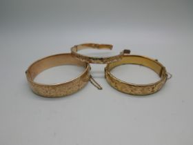 Two rolled gold bangles and a scrap 9ct rolled gold bangle - 61g
