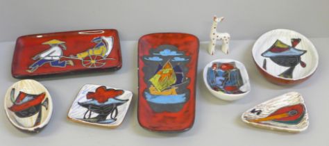 A San Marino pottery wall plaque and one other, five pin dishes and a small model giraffe