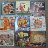 Twelve TV/Film compilation LP records including Grease