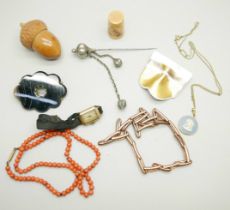 A coral necklace, a Rosenthal Studio Line brooch, an agate brooch, a carved 'acorn' cotton holder,