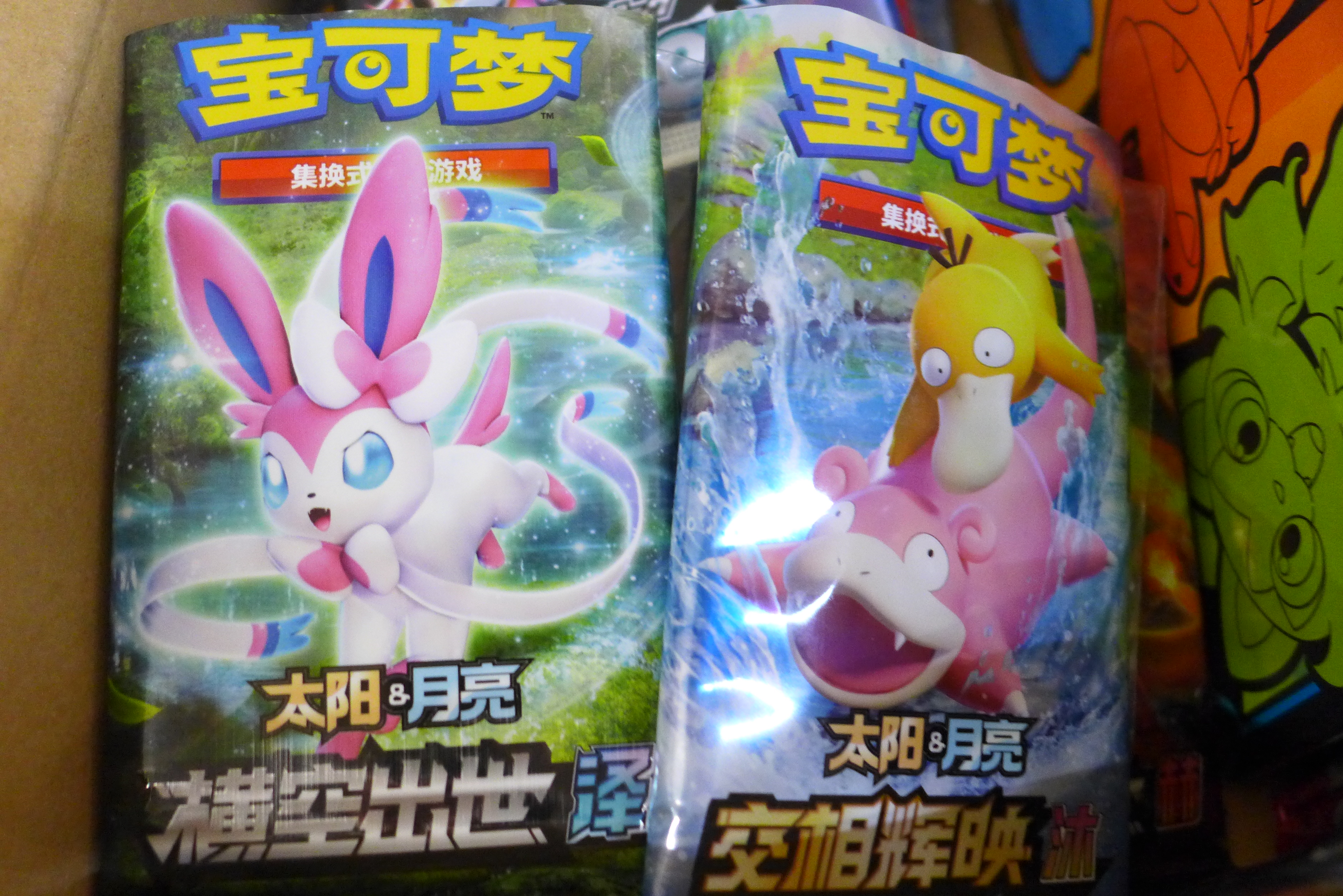 A box of English and Japanese Pokemon Evolutions packs, opened plus Chinese and Korean - Image 2 of 7
