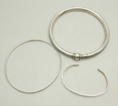 Three silver bangles, largest 8.5cm internal diameter, 50g