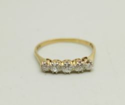 An 18ct gold five stone diamond ring, 2.7g, U