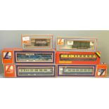 A collection of 00 gauge model rail; Hornby R437 BR Coach composite, Lima models Clay Cross plank