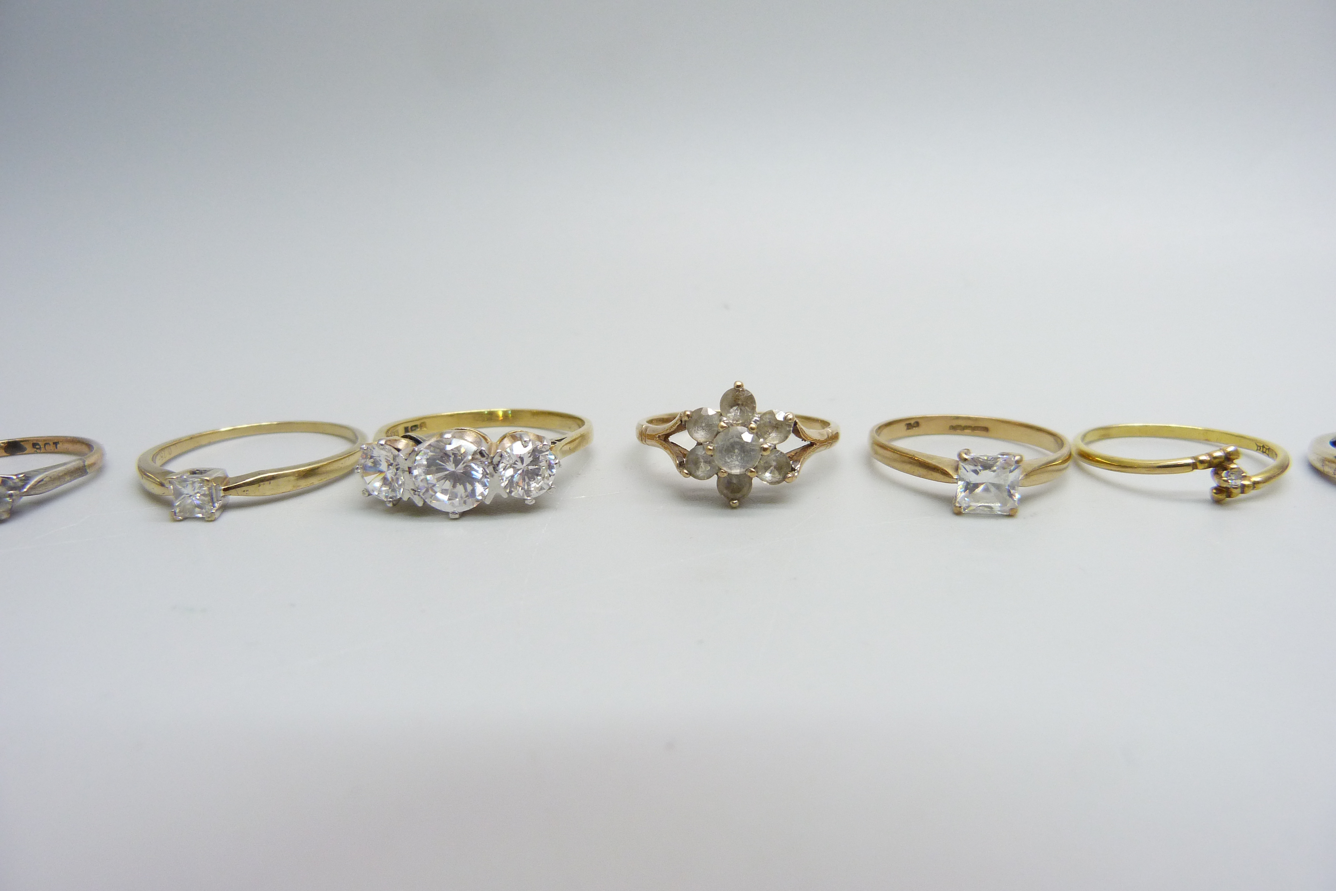 Eight 9ct gold rings, one set with 0.25 carat square diamond, 15g total weight - Image 3 of 4