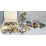 A collection of lead farmyard animals and accessories, playworn, some a/f