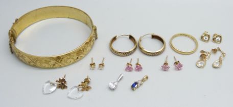 An 18ct gold ring, 3g and size S, seven pairs of 9ct gold earrings, two 9ct gold pendants and a