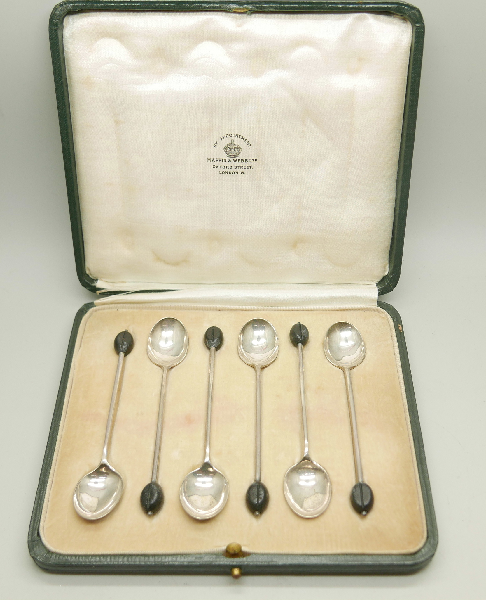 A Mappin & Webb set of six silver coffee bean spoons, 50g