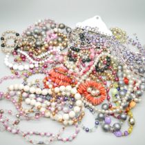 Thirty 1980s Czech bead and other bead necklaces, old shop stock