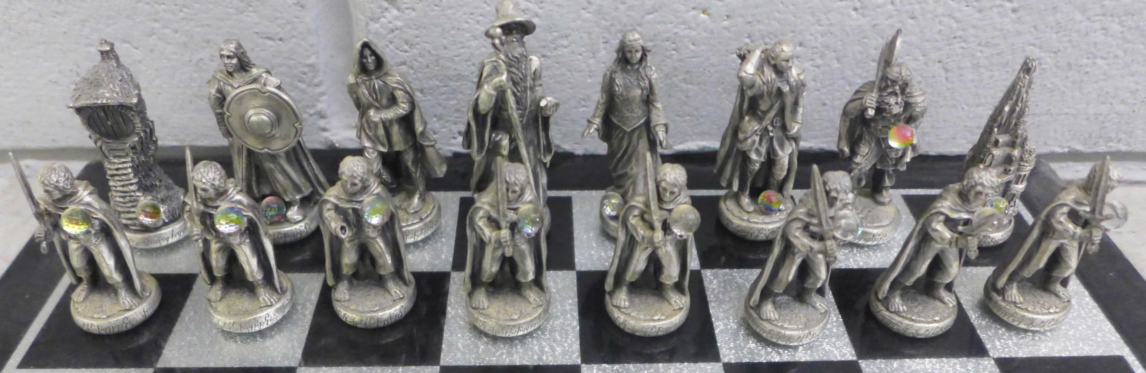 A Lord of The Rings pewter chess et by Tudor Mint, complete with glass board and pieces, in - Image 2 of 15