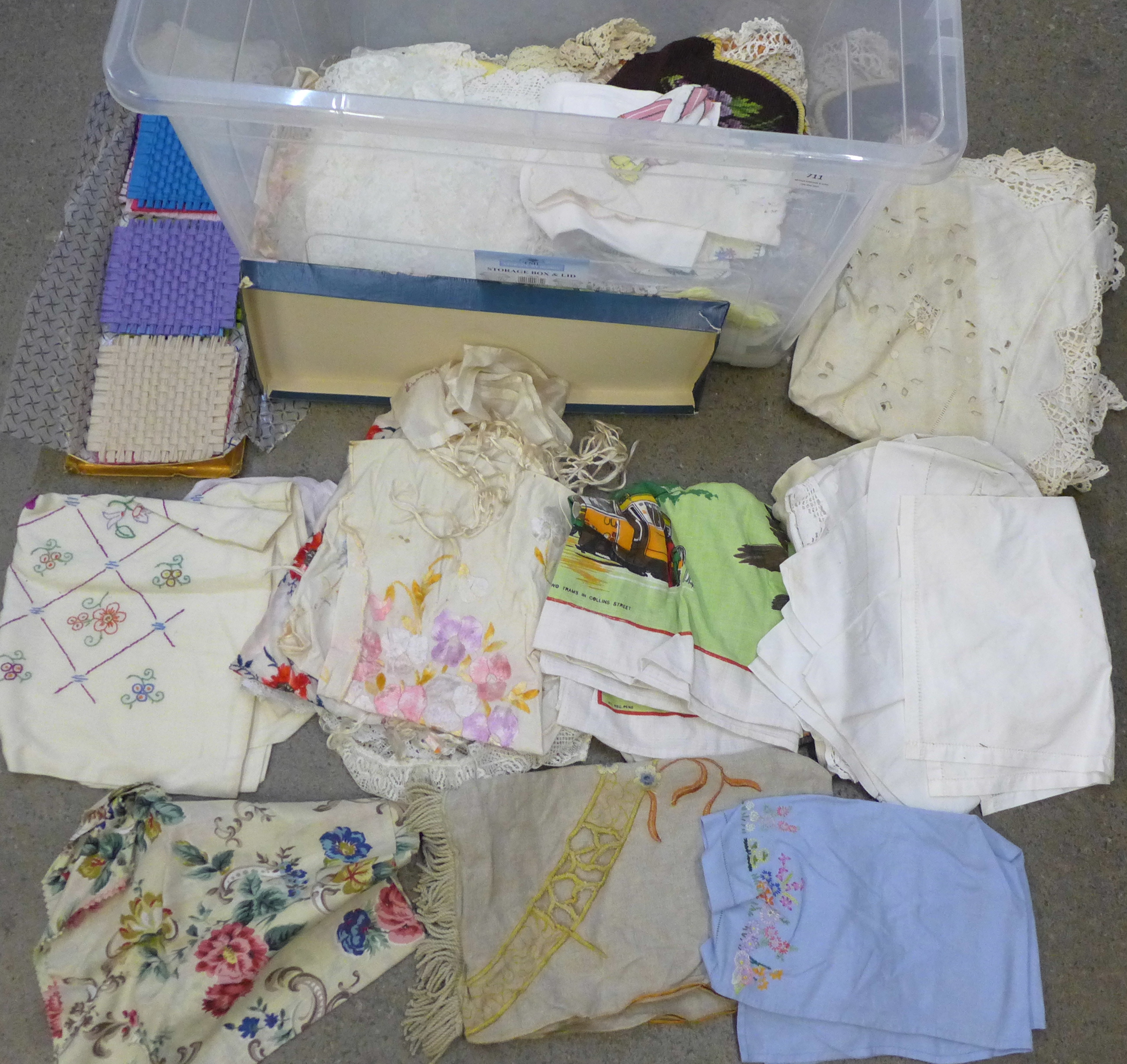 A box of vintage embroidered linen, table cloths, etc., lace edged and crochet work