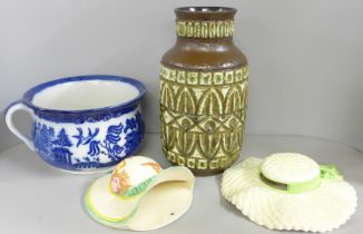 A West German vase, 30cm, two Falcon ware wall plaques and a Doulton Burslem blue and white