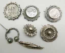 Seven brooches including Victorian, one hallmarked silver and one name brooch, (7)