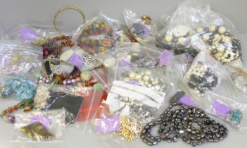 A collection of costume jewellery, necklaces, etc., including silver
