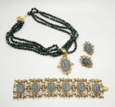 A vintage Napier black cameo jewellery set, (necklace, bracelet and earrings)