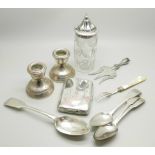 A collection of silver items; three Irish silver spoons, one other silver spoon, a cigarette case, a