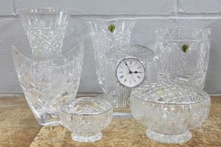 A Waterford Crystal clock, two Waterford Crystal vases, two Bohemia crystal posy vases and two other
