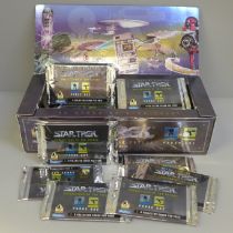 Thirty-five sealed packs of Star Trek Reflections of the Future Phase One cards