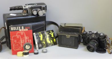 Three cameras, Busch compact, Zenit EM and Bolex B8SL cine camera, case with key