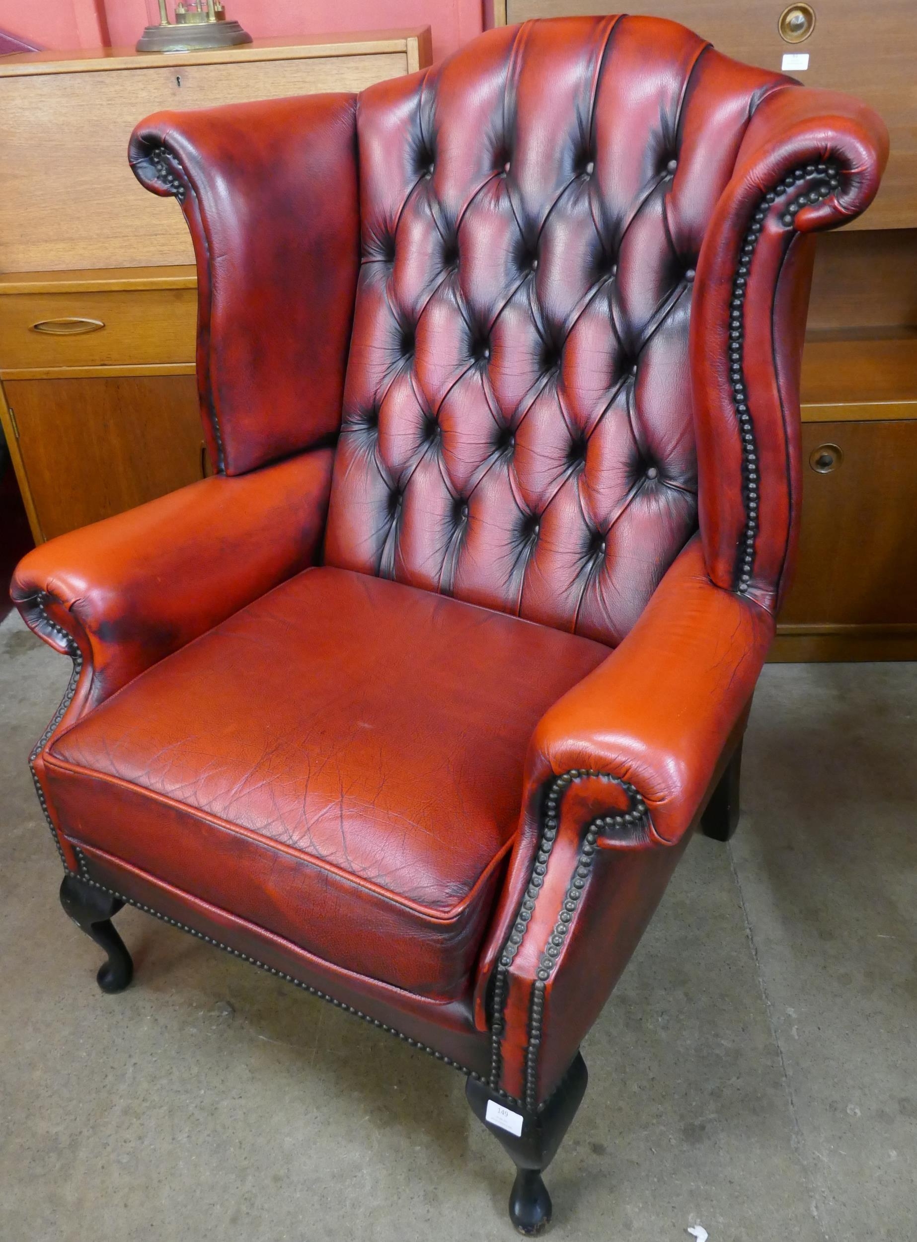 An oxblood red leather Chesterfield wingback armchair - Image 2 of 2