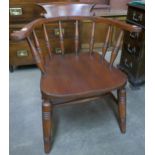 A Victorian beech smokers bow chair
