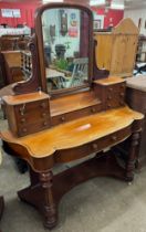 A Victorian mahogany dressing table and a washstand