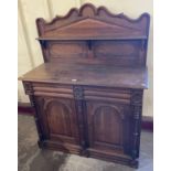 A Victorian aesthetic movement carved oak chiffonier